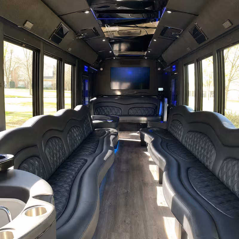 Friends laughing during a St. Louis party bus celebration