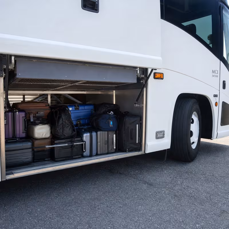 Party bus interior with wraparound leather seating and LED lighting in St. Louis