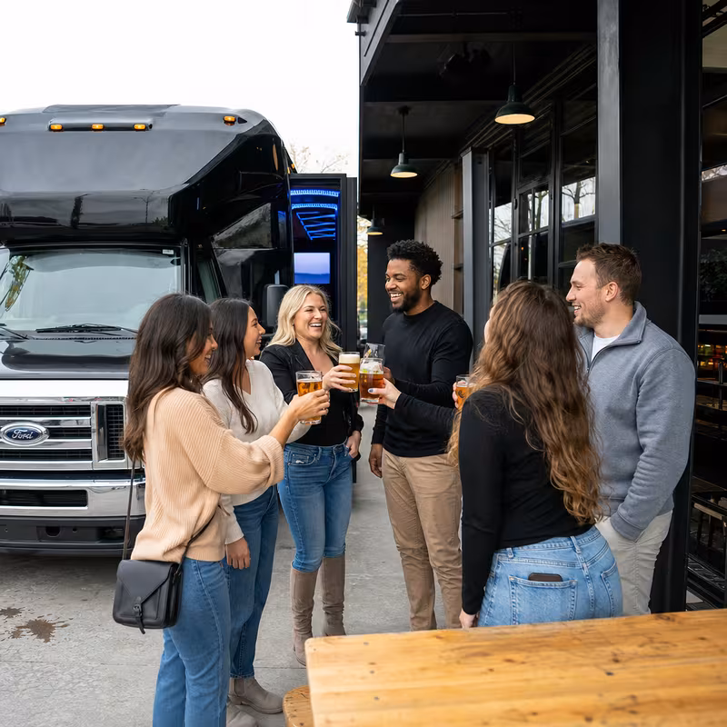 Passengers loading luggage while boarding an St. Louis group shuttle